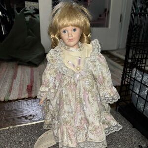 Crown Porcelain Doll with Blonde Hair and Floral Dress